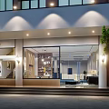 Modern Mall Store Featuring Large Glass Windows Interior Display Shelves Lighting Entrance Trees and Car