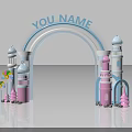 Colorful Playful Archway With Blue YOU NAME Text And Pink Blue Towers Lollipop Decorations