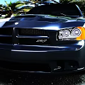 Stylish Dark Gray Muscle Car With Sporty Exterior Design And Shiny Alloy Wheels