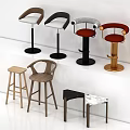 Various Modern Bar Stools With Wooden Metal Frames And Colored Seats