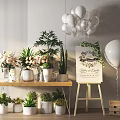 Assorted Potted Bonsai Plants Arranged On Wooden Table With Various Pots And Decorative Accents