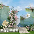 Floral Art Installation with Landscape Background Golden Frames and Colorful Blooms on Green Grass