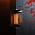 Contemporary Wall Lamp Design with Warm Light Shade and Red Maple Leaves on Dark Wall