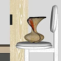 Ceramic Vase On Chair With White Cushion Black Frame Light Wooden Door White Wall