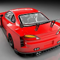 Red Sports Car With Aerodynamic Body Kit And Rear Wing
