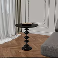 Stylish Black Round Side Table With Spiral Base On Wooden Floor Near Sofa