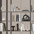 Modern Decorative Ornament Set With Books And Sculptures On Neutral Bookshelf