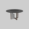 Round Dark Dining Table With Central Black Circle And Geometric Metal Legs
