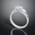 Elegant White Gold Engagement Ring With Round Diamond And Side Stones