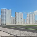 Urban Modern Commercial Street With Tall Skyscrapers Blue Sky White Clouds And Paved Road