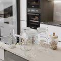 Clear Glass Jars On Kitchen Countertop For Olive Oil And Beans Storage Organization