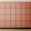 Coral Pink Multiple Door Lockers Against White Wall With Wooden Floor