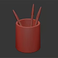 Colorful Pen Holder With Yellow And Green Stripes Containing Various Colored Pens