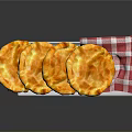 Golden Baked Flatbreads on White Tray with Red Checkered Napkin