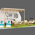 Camping Caravan Setup With Car Outdoor Tables Chairs Awning And Wave Signboards On Grass