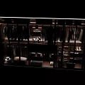 Modern Wardrobe Interior With Organized Clothes Bags Shoes And Layered Shelves