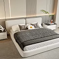 Modern Double Bed Interior with White Headboard Striped Duvet Pillows and Green Plant Side Tables