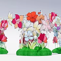 Colorful Paper Floral Installation With Various Colored Flowers On Green Circular Bases