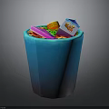 Blue Trash Can Filled With Various Waste Items Like Drink Carton And Plastic