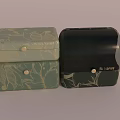 Decorative Ornament Set with Stacked Light Green Floral Pattern Boxes and Black Fairy Label Case