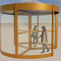 Golden Framed Revolving Door With Transparent Glass Panels And People Entering