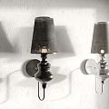 Modern Black and Silver Wall Lamps with Fabric Shades Mounted on White Wall