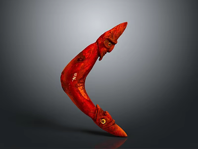 Red Curved Hand Carved Weapon With Carved Face And Eyes Details 3d model