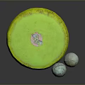 Yellow Flying Disc With Cartoon Design And Two Gray Balls