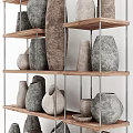 Gray and Brown Ceramic Vessels Arranged on Wooden Shelves with Various Shapes