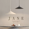 Minimalist White And Black Conical Pendant Lights In Modern Interior Above Table