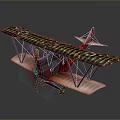 Vintage Biplane Model With Camouflage Wings Red Propeller And Tail