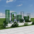 Floral Art Installation With Green Plants Silver Spherical Decorations And White Base