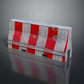 Red And White Striped Concrete Barrier With Worn Marks And Reflection On Black Background