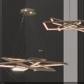 Modern Geometric Illuminated Chandelier With Sleek Metal Structure And Dark Wall Background