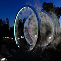 Nighttime Photo Check-in Spot Featuring Circular Glowing Rings Smoke Pathway And Spherical Lights