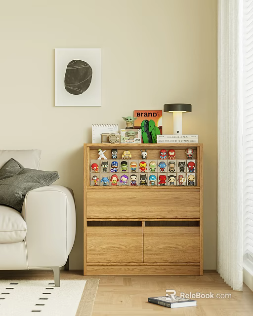 Decorative Figurine Set On Wooden Cabinet With Table Lamp Books And Small Plant 3d model 