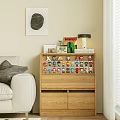Decorative Figurine Set On Wooden Cabinet With Table Lamp Books And Small Plant