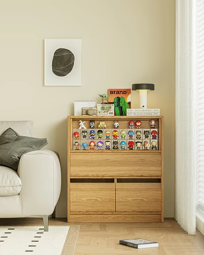 Decorative Figurine Set On Wooden Cabinet With Table Lamp Books And Small Plant 3d model