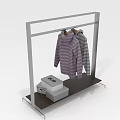 Modern Clothing Rack With Striped Sweaters And Wooden Shelf Holding Boxes