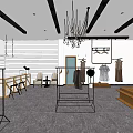 Modern Clothing Store Interior With Hanging Clothes Display Racks And Seating Area