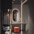 Modern Luxury Hotel Room Bathroom with Round Mirror Illuminated Light Strips Gray Walls Orange Stool