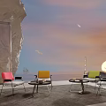Outdoor Table Arrangement With Colorful Chairs And Seaside View Under Sunset Sky