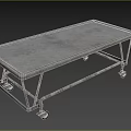 Sturdy Metal Medical Cart With Four Wheels And Flat Surface For Hospital Use