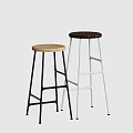 Two Stylish Bar Stools With Wooden Seats And Metal Legs In Black And White