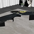Modern Black Marble Coffee Table with Irregular Shape on Gray Rug and Fruit Bowl