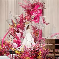 Floral Installation With Pink Red Yellow Flowers Hanging Arrangements And Transparent Structures