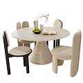 Elegant Modern Round Dining Table With Upholstered Chairs Vase And Open Book 3d model
