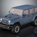 Blue Jeep Rubicon Four Door Off Road Vehicle With Large Tires And Shiny Wheels