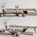 Modern Light Gray Sofa and Round Coffee Table Set with Decorative Plants and Floor Lamp