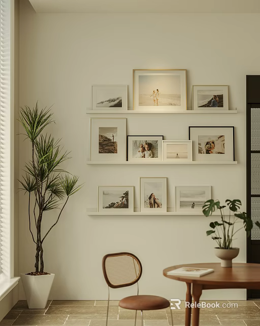 Stylish Photo Wall Decor with Framed Pictures on White Wall and Potted Plants 3d model 